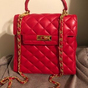 Beautiful small red bag by Bloomingdale’s